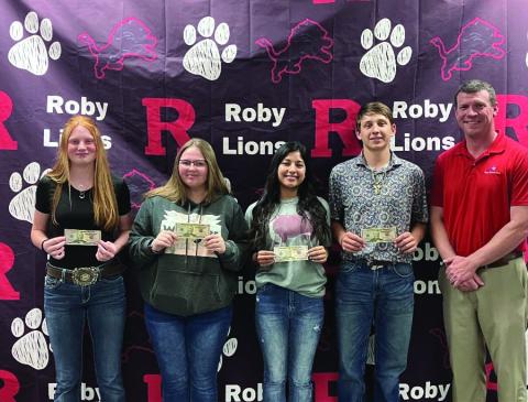 Pictured (L to R): Abigail Carlile-Freshman, Sara Baily-Sophomore, Carly Jimenez-Junior Dawson Shipp - Senior, Chris Bibb- Texas National Bank Senior Vice President