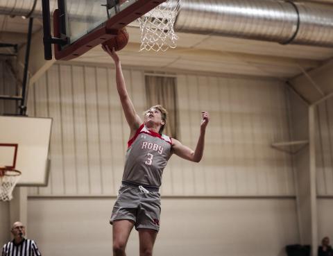 Roby senior Caiden Guy goes up for an easy layup during the Senior Caiden Guy also set a record for most points scored in a single game, putting up 55 of Roby's 91 points. PHOTO BY: MARK MARTINEZ