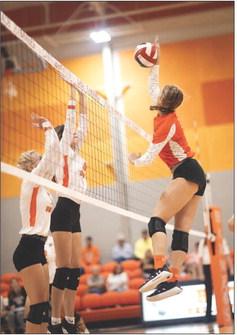 Lady Hammer Senior Becca Kincheloe fires a kill over Lady Dragon defenders during Rotan's win over Paducah Tuesday night. Photo by Mark Martinez