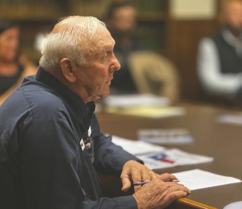 Stonewall County Commissioner Shorty Martin listens as representatives from ENGIE North America outline plans for the upcoming Swenson Solar Project during the October 27 Commissioners Court meeting in Aspermont.