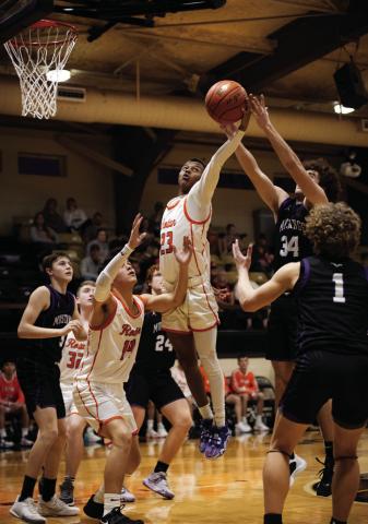 Rotan senior Jordan Daniel goes up for a rebound during the Hammers' Bi-District loss to the Benjamin Mustangs this past Monday. Photo by: Mark Martinez