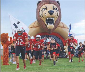 Roby CISD's Little Lions got to run out of the tunnel with their 'Bigs' before the game Friday night.