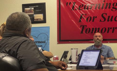 AISD Board President Lorenzo Calamaco and Superintendent Zach Morris share opposing views during Monday's meeting.