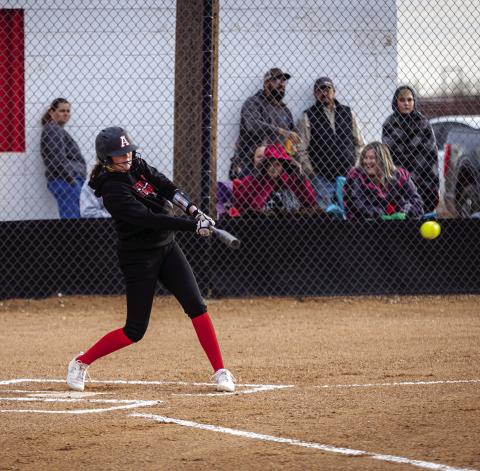 Aspermont's Georgia Fraser hits a line drive during the Lady Hornets 18-3 dominant win over Knox City this past Monday. The Lady Hornets next matchup will be against district foe Hermleigh this Friday at 5pm in Hermleigh. PHOTO BY MARK MARTINEZ