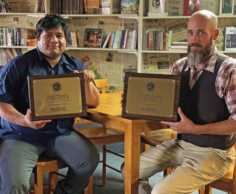 DMC Photographer Mark Martinez and editor, Jeff Hurt hold first place awards in Sports Photography and Editoral writing awarded duirng this year's Texas Press Association's Better Newspaper Contest.