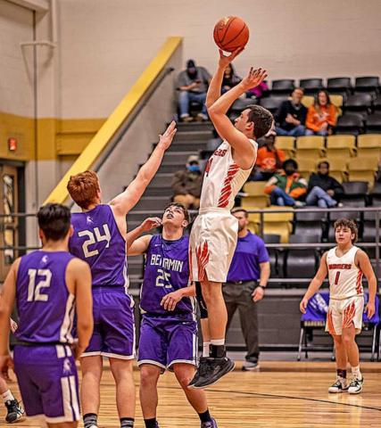 Rotan Senior, Koy Bell hangs in the air to shoot for two points.