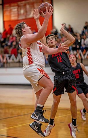 Rotan Yellowhammer Senior, Dylan Jeffrey puts two points on the board to ehlp secure a win agains the Roby Lions.
