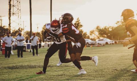 Freshman Isaiah Johson fights towrads the endzone while dragging an Eagle defender during the Aspermont Hornets narrow 47-48 loss to Southland last Friday night. The Hornets are now 1-1 going into week 3 and will take on Spur next in Spur this Friday night at 7:30pm. Photo by: Mark Martinez