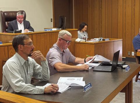 Fisher County officials follow along as auditors present highlights from the county’s 2024 financial audit, which shows significant increases to the county’s surplus revenues.