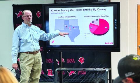 Parkhill partner Allan Wolf, a bond-planning specialist, outlines the firm's 80 years of experience working with school districts across the region during Roby CISD's Sept. 23 special-called meeting.
