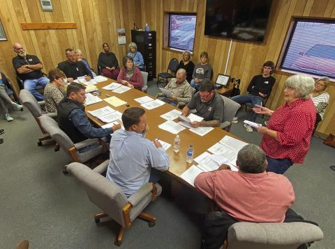Aspermont resident Marcia Duggan speaks to council members on behalf of the more than a dozen concerned citizens during Tuesday's meeting.