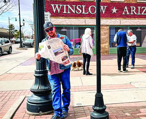 The Nomadic Newspaper is standing on the corner in Winslow Arizona