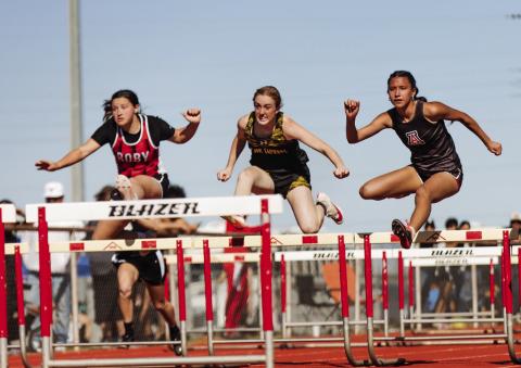 Roby's Kailyn Shipp (left) &amp; Aspermont's Emilee Silva (right) battle in the 100 M Hurdles. PHOTO BY: MARK MARTINEZ