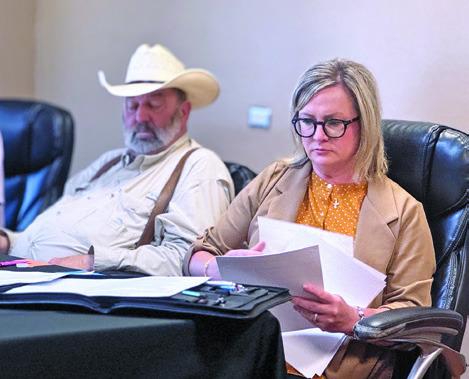 FCHD Board of Directors Vice president, Sarah McLen reviews the proposed tax abatement agreement with IREN Energy ahead of its approval on July 31.