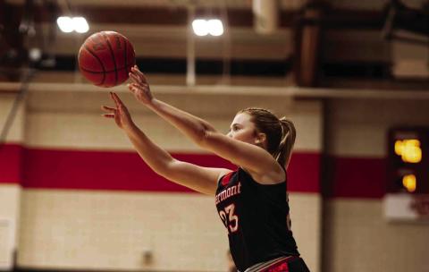 Senior Matti Polk fires a corner three-pointer.