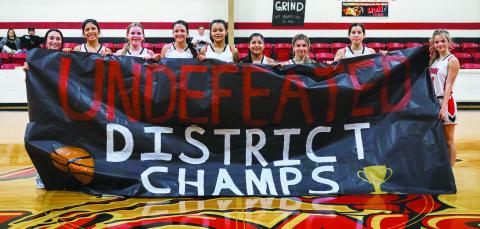 District 15-A Champion Roby Lady Lion Basketball Team L-R: Avery Carreon, Yessica Perez, Keegan McWilliams, Hailee Garmer, Joselynn Williams, Carly Jimenez, Lilly Benson, Ivy Espinoza, Chasity Benson. The Roby Lady Lions finished out their season on top, defeating the Paint Creek Lady Pirates Tuesday night 71-8 to go undefeated in district play. The Lady Lions will begin their post-season campaign against Vernon Northside this coming Tuesday at 7:15pm in Munday. PHOTO BY MARK MARTINEZ