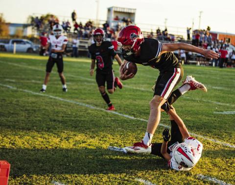 Roby Junior Kullen Daniel slips through a Bear defender to walk into the endzone during the Lions' 58-12 win over Baird last Friday night. With the win, the Lion's improve to 4-1 on the season, while in the process avenging their 0-64 loss to the Bears last season. The Lions will have a bye week this week before commencing district play next Friday night against the Ira Bulldogs in Roby. PHOTOS BY: MARK MARTINEZ