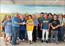 Members of the Rotan Volunteer Fire Dept. recieve a donation check in the amount of $500 from Plainview Lions via Fisher COunty Lions Club