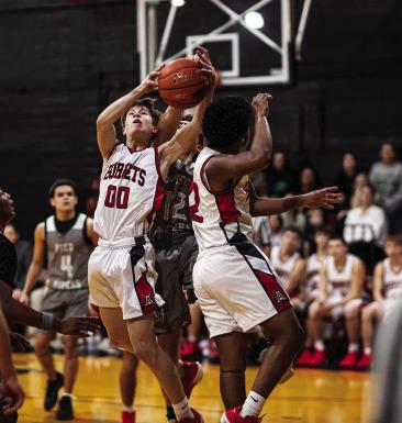 Aspermont's Graden Rabel comes down with a tough rebound during the Hornets 30-34 loss to Hamlin last Friday night. PHOTO BY: MARK MARTINEZ
