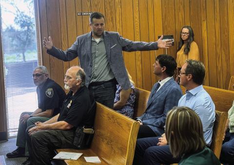 Bair Energy Vice President of Development Kyle Medders explains the company’s water philosophies to Fisher County officials and members of the public in attendance during its June meeting where officials approved the company’s water line easement.