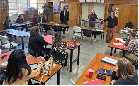 Aspermont ISD superintendent Zach Morris looks on while principal Tiffany Potts presents campus administrators from throughout Region 12 with innovative concepts for improving educational pathways as part of an administrative training camp the district hosted earlier this week.