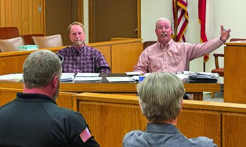 Fisher County Commissioners Preston Martin and Micah Evans discuss financial and operational expectations with Chief Deputy Jarod Smith and Sheriff Tom Pohlman during Monday's budget workshop