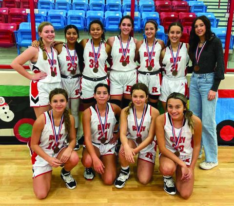 Lady Lion Consolation Championship team at Borden Co. tournament: Standing L-R: Keegan McWilliams, Chelsea Jimenez, Joselynn Williams, Mackenzie Castillo, Hailee Garmer, Laja Mawick, Hope Garmer. Kneeling L-R: Lilly Benson, Ivy Espinoza, Chasity Benson, Avery Carreon.