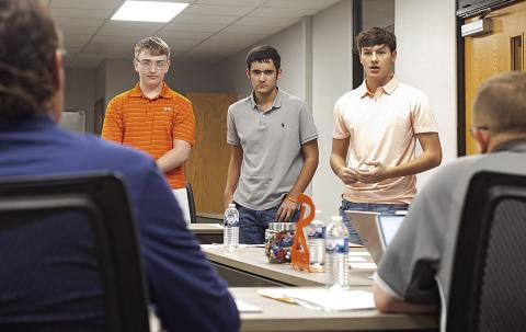 Rotan ISD Juniors, Hunter Harris, Corbin James and Justin Shelley address the board during Monday night's meeting. PHOTO BY: MARK MARTINEZ