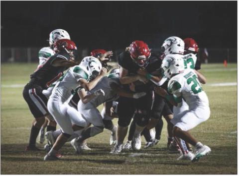 Senior David Adkisson powers through Hornet defenders to score during the Roby Lions 37-7 win over Blackwell last Friday on Homecoming. With the win, Roby improves its record to 2-1 on the season. This week, the Lions travel to Petersburg to take on the (0-3) Buffaloes. Photo by: Mark Martinez