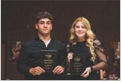 Seniors Kolby Bradshaw &amp; Matti Polk recieving the A.I.S.D. Student of the Year Award.