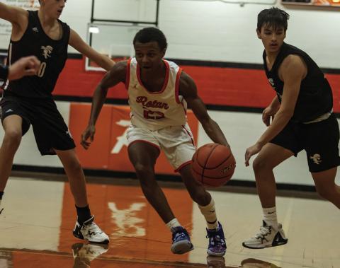 Rotan senior Jordan Daniel weaves through Pirate defenders during the Hammers 42-80 loss vs. Eula over the Christmas break.