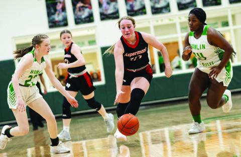 Aspermont senior Raelynn Bradley fast breaks through a pair of Lady Piper defenders during the Lady Hornets 52-21 win over Hamlin this past Friday night. The Lady Hornets remain stern in their battle for a top spot in district play. They will host the Rule Lady Bobcats this Friday at 6pm in Aspermont. Photo by: Mark Martinez