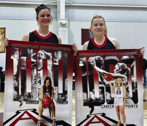 Lady Hornets Keslie Criswell &amp; Matti Polk pose together after they both acheived 1000 career points during their 74-17 win over Paint Creek last Tuesday. Courtesy Photo