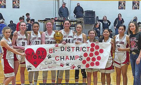 Bi-District Champion Lady Lions Top L-R: Chasity Benson, Callie Humphrey, Joselynn Williams, Laney Stewart, Mackenzie Castillo, Hailee Garmer, Lilly Benson, Carly Jimenez, Ivy Espinoza, Hope Garmer.