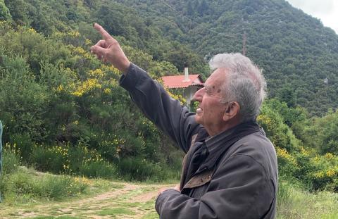 Panagiotis Panagiotopoulos points to where his father rescued our father 80 years ago.