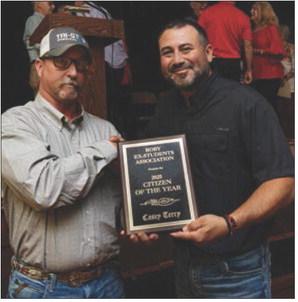 Fisher County Commissioner and Roby Alumni Class of ‘99 Micah Evans presented the Roby Ex- Student Association Citizen of the Year award to Casey Terry Class of ‘96 during the Ex’s Program held on Saturday afternoon at the Roby CISD Auditorium.