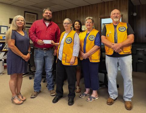 Rotan City Administrator Carla Thornton, Rotan Mayor Zach Johnson, Lion Club Members Carolyn Hargrove, Linda De Los Santos, Fredda Buckner, John Dickson