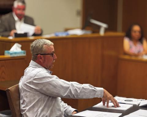 Fisher County Commissioner Micah Evans defends his position for a 5% salary increase in line with the proposed budget.