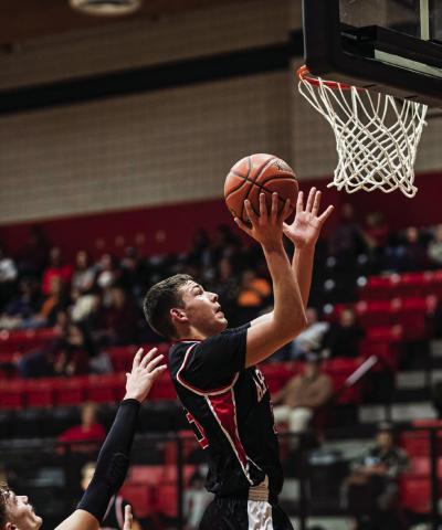 Aspermont Freshman Jaxon Hodges puts up shot during the Hornets 42-34 loss to Anson Tuesday night. This weekend, the JV Boys will travel to take part in the Guthrie tournament while the Varsity Boys will take part in the Munday tournament respectively. PHOTO BY: MARK MARTINEZ