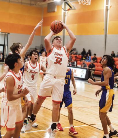 Left: Rotan Senior Hunter Harris puts up a rebound shot during the Hammers' 62-24 win over the Trent Gorillas Tuesday night. The Hammers will take part in the Wellman Tourney this weekend Thursday - Saturday TBD PHOTO BY: MARK MARTINEZ
