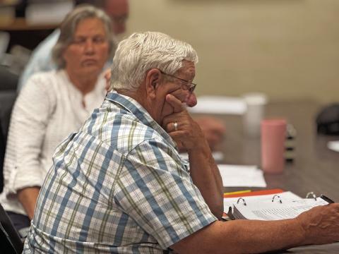Rotan City councilman Loyd Green reviews the fist reading of proposed ordinance in August that will increase the city’s water rates