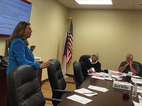 SMHD Board President Ellen Abernathy and CEO Michael Moorhead listen closely as Deborah Whitley, financial advisor with Forvis, shares insights into district finances and what’s on the horizon for healthcare.