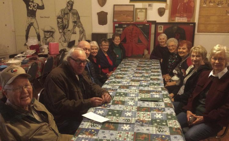 Bobby Gruben, Don Weems, Larry Field, Elaine Field, Cindy Fryar, Lenice Dennis, Zenita Gardner, Kathryn Pendergrast, Rose Ann Ely, Manan Green, Dot Harris and Roenna Thomas (not pictured) enjoyed a Potluck Christmas Supper at the December meeting.