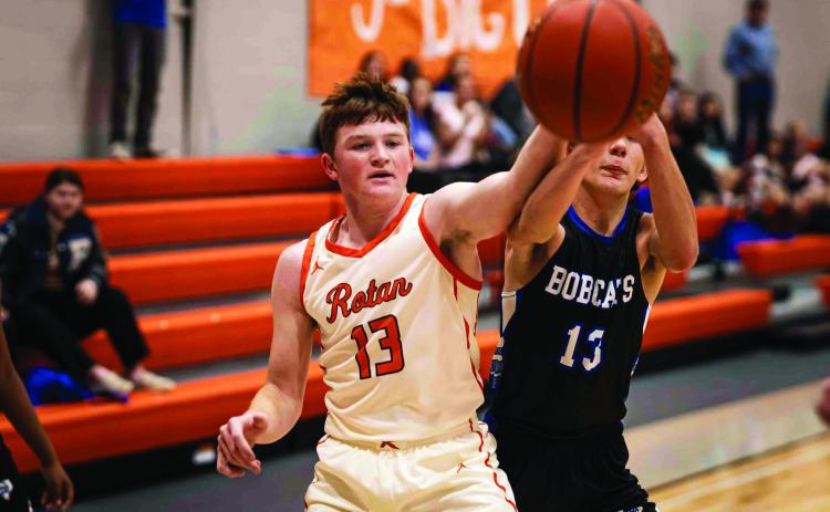 Rotan's Tucker McWilliams fights for a loose ball during the Hammers' 38-34 win over the Rule Bobcats last Friday. Photo by: Mark Martinez