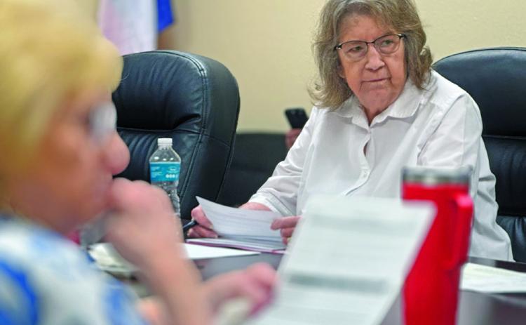 SMHD Director Ruthie Elkins listens as hospital administration explains the specifics of the annual budget and tax impacts.