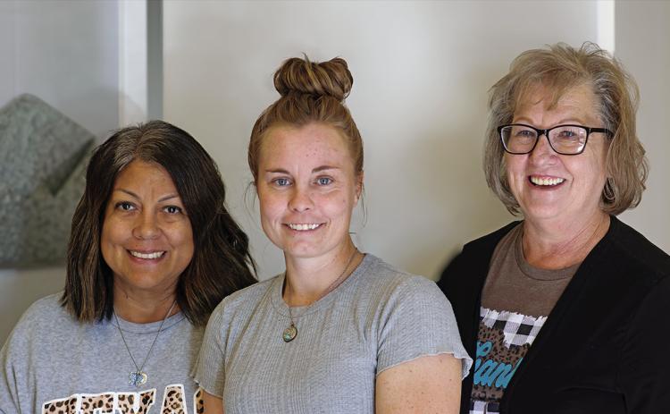 Laura Carrion, Tammy Powel, Holly Buffkin - Thankful for God and the blessings we have. Thankful for friends and lots of family. PHOTO BY JEFF HURT