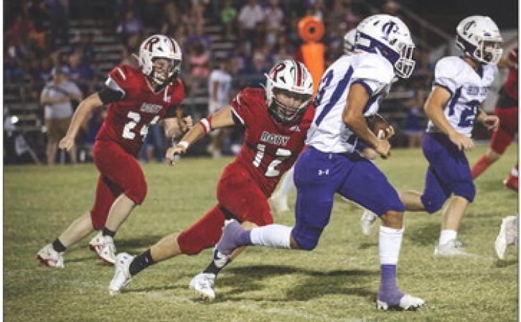Lion Junior Brady Etheredge pursues the Hornet ball carrier during the Lions 6-54 loss to Irion County this past Friday. Photo by Tricia Hurt