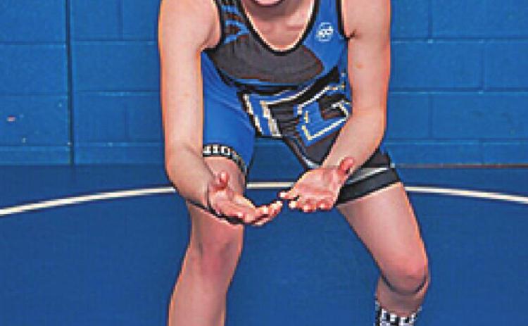 London Hudnall wrestles her