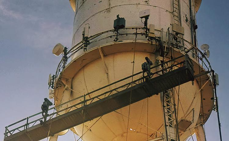 Rehabilitation begins this week on the 100 year old water tower in Rotan. Once the interior repairs are made, work crews will shroud the south tower to protect neighbors from dust and debris.