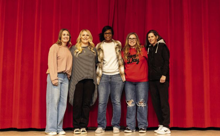 Members of the 2009 Lady Lion Basketball State Championship Team L-R: Danci Dennis, Kimie Lakey, Kim Williams, Kamie Guinn, then head coach Amy Huseman.